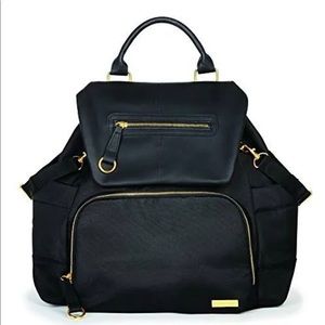 Add polish with the Chelsea Diaper Backpack with side bottle pockets + m…